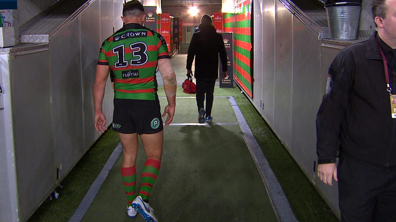 Sam Burgess gingerly walks up the tunnel after succumbing to a hamstring complaint.