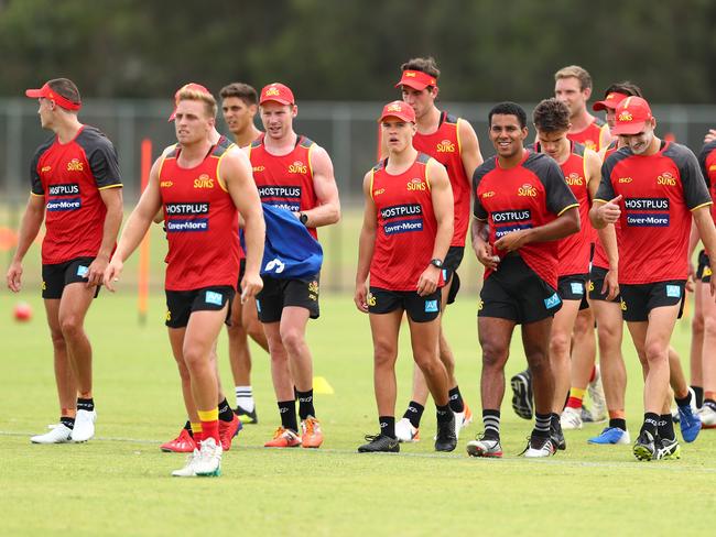 GOLD COAST, AUSTRALIA - NOVEMBER 04: Players talk during a Gold Coast Suns AFL media and training session at Metricon Stadium on November 04, 2019 in Gold Coast, Australia. (Photo by Chris Hyde/Getty Images)