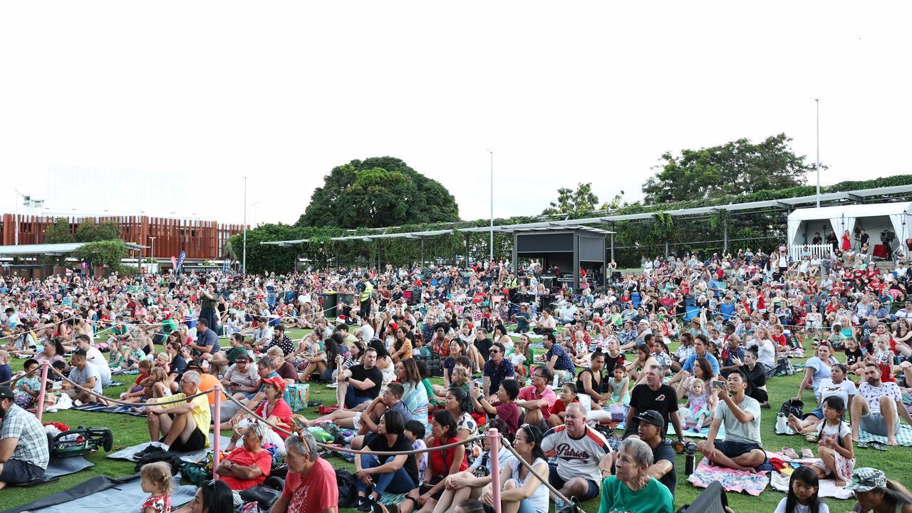 A large crowd gathers under fine skies at the Carols in the Park, held at Munro Martin Parklands. Picture: Brendan Radke