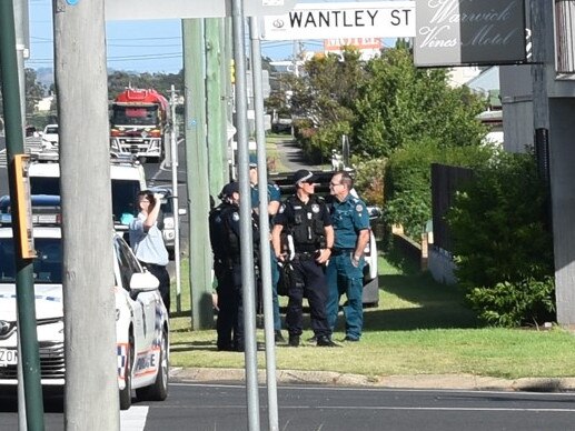 Officers outside Wantley St, Warwick, Tuesday morning. Photo: Michael Hudson.