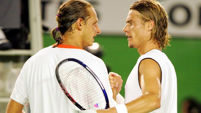 Nalbandian and Hewitt shake hands after their epic match at the Australian Open in 2005.