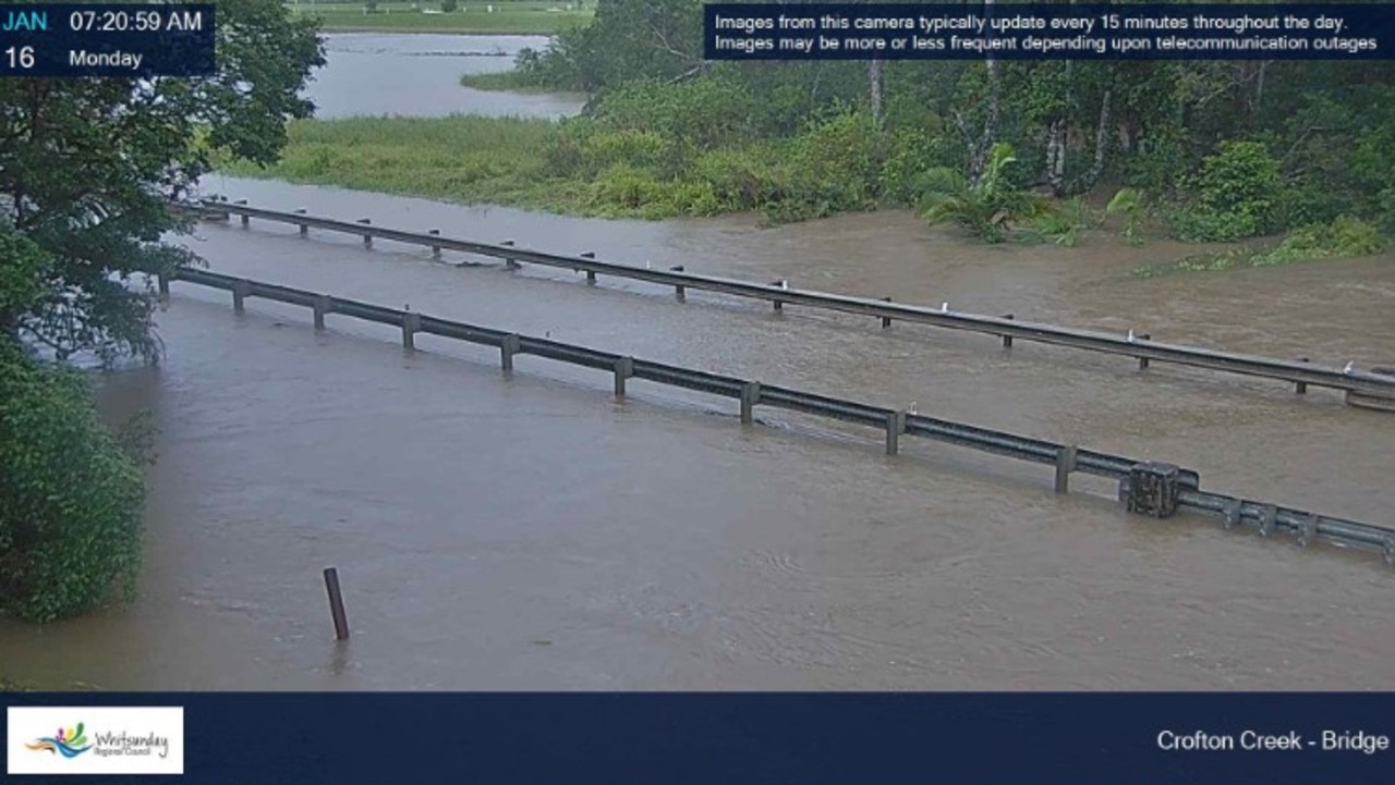 Whitsunday Regional Council flood cameras have captured the roads under water at Crofton Creek bridge.