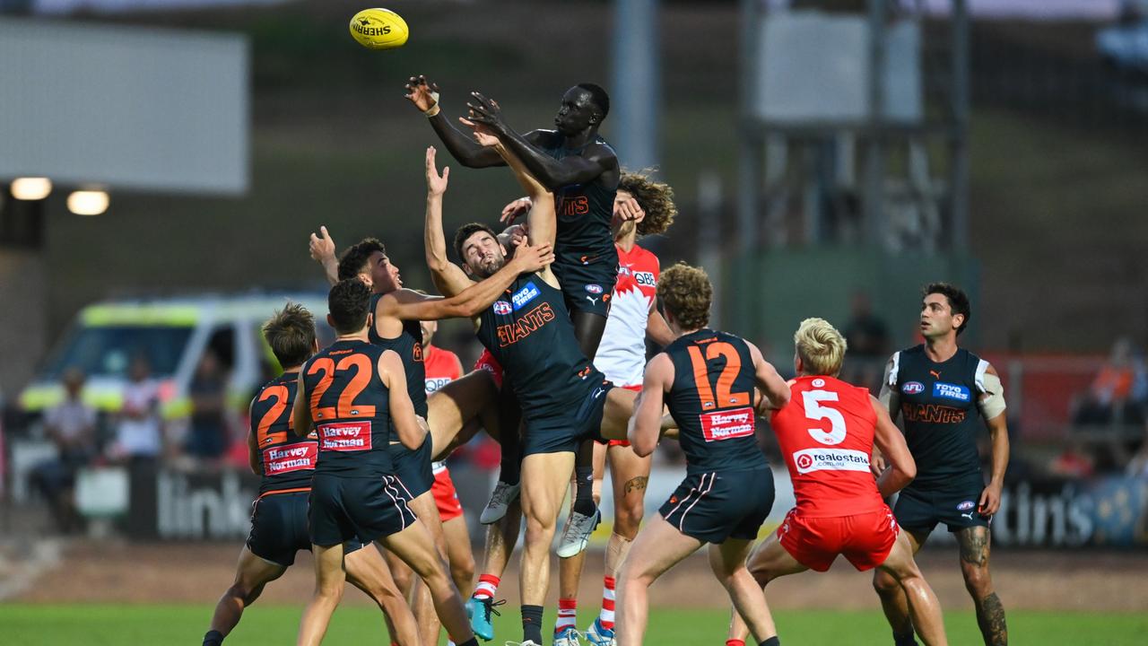 Leek Aleer soars for a mark in a pre-season game this year for the Giants. Picture: Getty Images