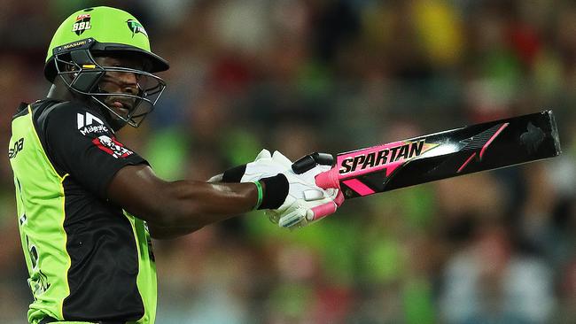 Sydney Thunder's Andre Russell's plays a shot with his all black bat on Tuesday night.