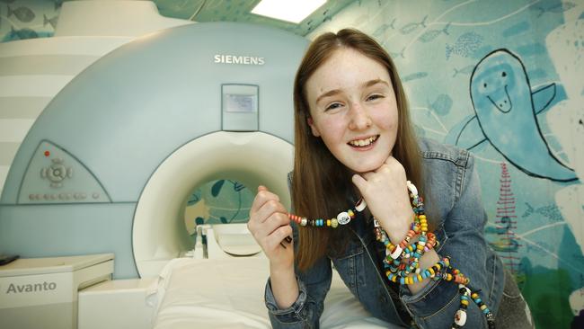 Rose Spence, 13, was diagnosed with a tumor in her spinal cord at 11 but her positive attitude has kept her family and friends afloat during the ordeal. Picture: David Caird.