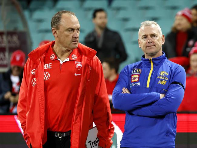 Adam Simpson and John Longmire chat post game. Picture: Phil Hillyard