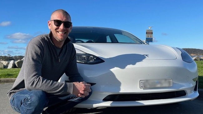 Eurobodalla mayor Matthew Hatcher with his Tesla.