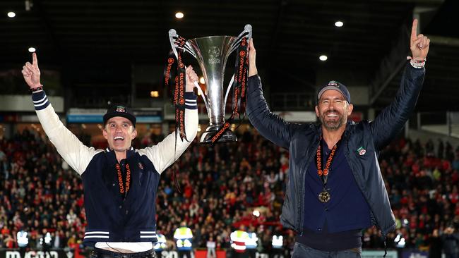 McElhenney and Reynolds lift the National Trophy last year. Photo by Jan Kruger/Getty Images