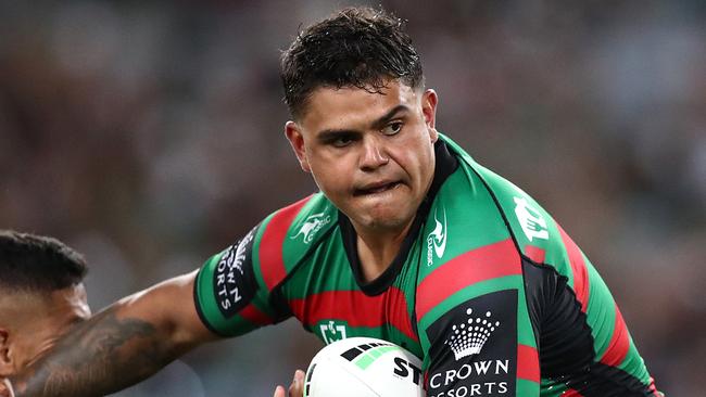 SYDNEY, AUSTRALIA - APRIL 08:  Latrell Mitchell of the Rabbitohs is tackled during the round five NRL match between the South Sydney Rabbitohs and the Brisbane Broncos at Stadium Australia on April 08, 2021, in Sydney, Australia. (Photo by Mark Metcalfe/Getty Images)