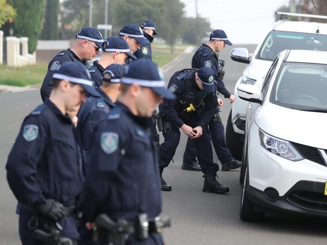 DAILY TELEGRAPH - Pictured are police and forensics at the scene of a shooting on Jones Street in Wentworthville last night where a man was shot in the leg and died due to blood loss.