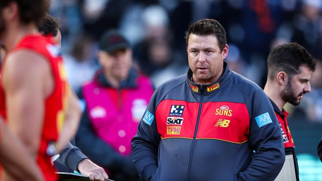 MELBOURNE, AUSTRALIA – JUNE 18: Stuart Dew, Senior Coach of the Suns looks on during the 2023 AFL Round 14 match between the Carlton Blues and the Gold Coast Suns at the Melbourne Cricket Ground on June 18, 2023 in Melbourne, Australia. (Photo by Dylan Burns/AFL Photos via Getty Images)