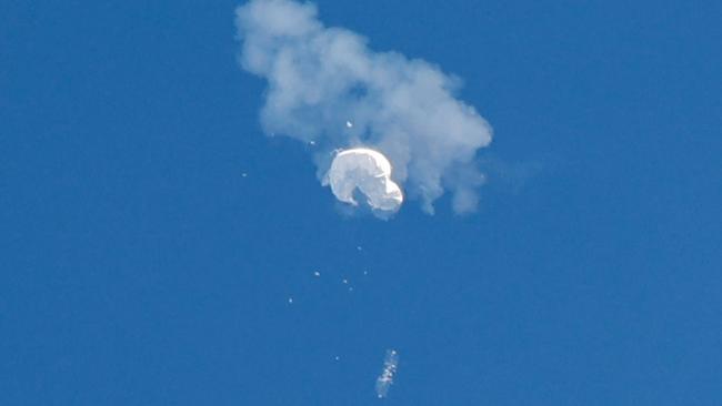 The suspected Chinese spy balloon drifts to the ocean after being shot down off the coast South Carolina in February. Picture: Reuters/Randall Hill