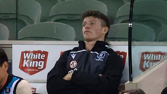 Mitch Georgiades looks on from the bench after being subbed from the match during the match against the Western Bulldogs. Picture: Getty Images