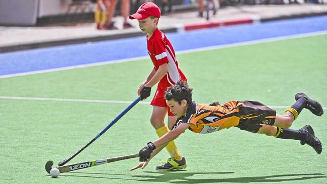 Easts&#39; D-Grade player Tom Savage throws himself in his work during the grand final. Easts beat Norths/Bellbowrie 11-0. Picture: Cordell Richardson