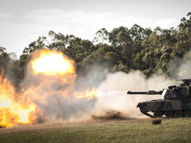 An Australian Army M1A1 Abrams tank fires at targets during Exercise Chong Ju at Puckapunyal training area, Victoria, on 16 May 2018. *** Local Caption *** Exercise Chong Ju is an annual live-fire training exercise conducted at the Australian Army’s Combined Arms Training Centre at Puckapunyal training area in northern Victoria to showcase capabilities to Army’s next generation of combat leaders.   Exercise Chong Ju 2018 included demonstrations from the M1A1 Abrams tank, ASLAV (Australian Light Armoured Vehicle), M113 armoured personnel carriers, 81mm mortars and M777 155mm howitzer artillery piece. Static displays of Land 400 CRV Boxer, Bushmaster Protected Mobility Vehicles, Hawkei Protected Mobility Vehicle – Light. Other capabilities on display will include the Tiger ARH, Unmanned Aerial Systems, Soldier Combat Ensemble, Battle Management System, as well as two Hawk 127 lead-in fighter aircraft from the Royal Australian Air Force.   Exercise Chong Ju is named after a battle in North Korea in 1950, when the 3rd Battalion, Royal Australian Regiment, supported by tanks and artillery, attacked and captured a large North Korean defensive line during their northward advance to the Yalu River.