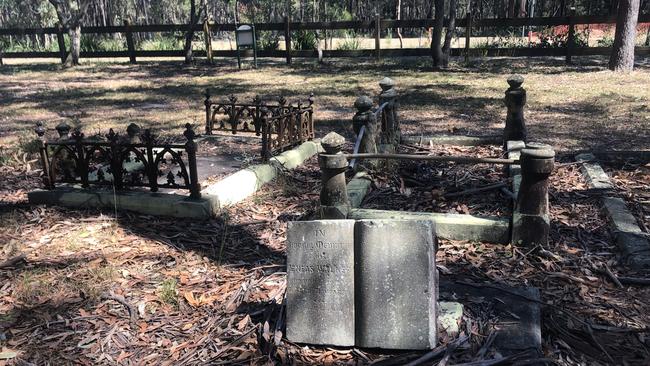 Construction tape (top right of picture) near graves at the historic Redland Bay site.