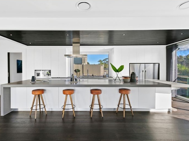 A huge bench in the kitchen.