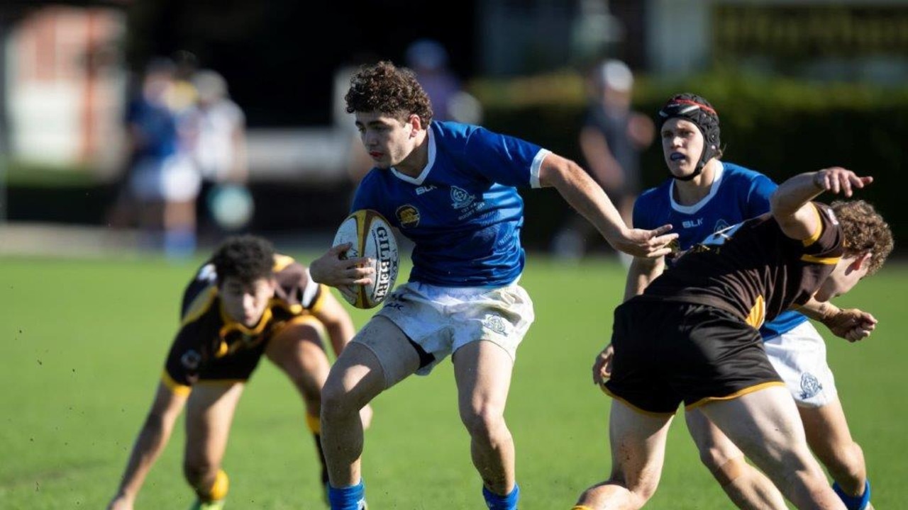 St Edmund's College rugby action against Padua College.