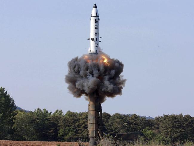 Mr Trump said after the meeting that North Korea was destroying a major missile engine testing site crucial to its development of mid-range solid-fuel missiles including the Pukguksong-2. pictured. It is thought to have been razed a week ago. Picture: Korean Central News Agency/Korea News Service via AP, File