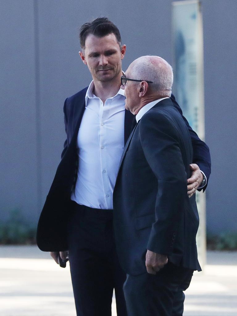 Patrick Dangerfield and Bryce Selwood, Troy's father at the service. Picture: Alan Barber