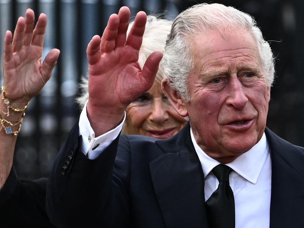 Britain's King Charles III and Britain's Camilla, Queen Consort greet the crowd upon their arrival Buckingham Palace in London, on September 9, 2022, a day after Queen Elizabeth II died at the age of 96. Picture: Ben Stansall / AFP.