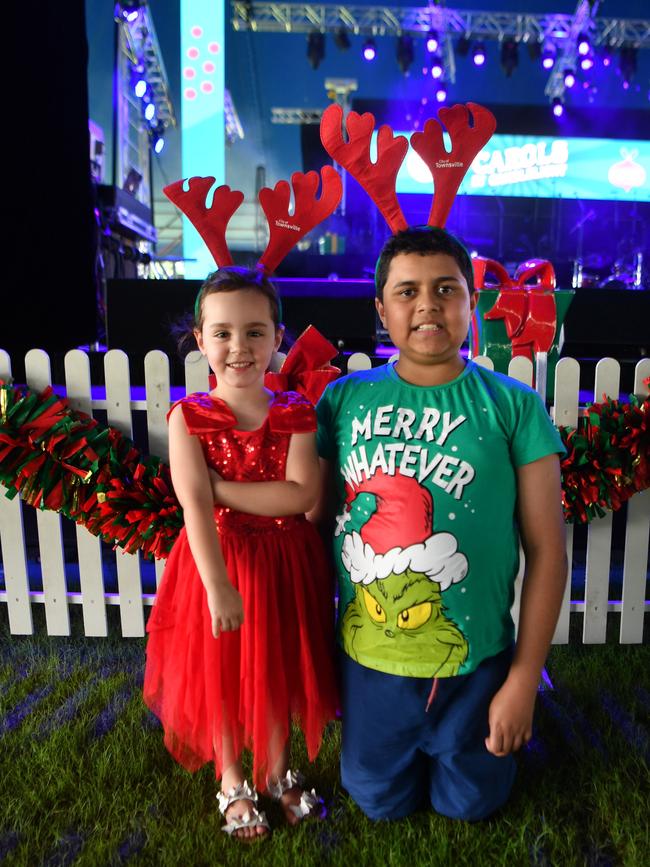 Carols by Candlelight at Riverway 2022. Charlize Christian, 3, and Glenn Prior, 10. Picture: Evan Morgan