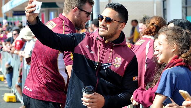 Valentine Holmes gets a selfie with a fan during a Queensland Maroons fan day.