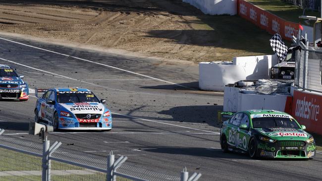 Mark Winterbottom narrowly holds on for victory in Supercars Race 9.