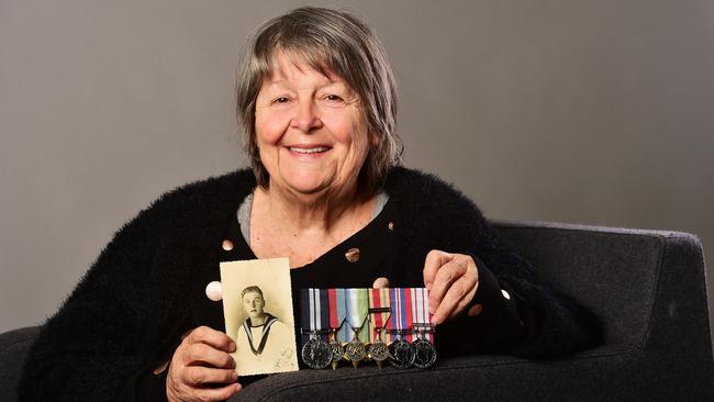 Judith Bronwyn Murphy with her father's Word War II medals. Picture: Shae Beplate.