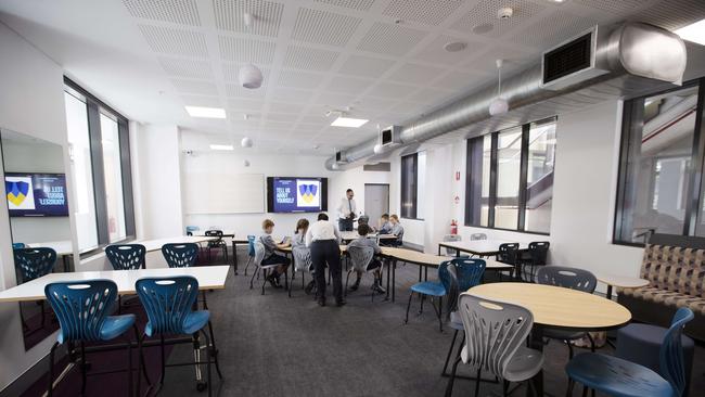 First day at Fortitude Valley State Secondary College. 585 St Paul's Terrace and Brookes St, Fortitude Valley, Brisbane, 28th of January 2020. (AAP Image/Attila Csaszar)