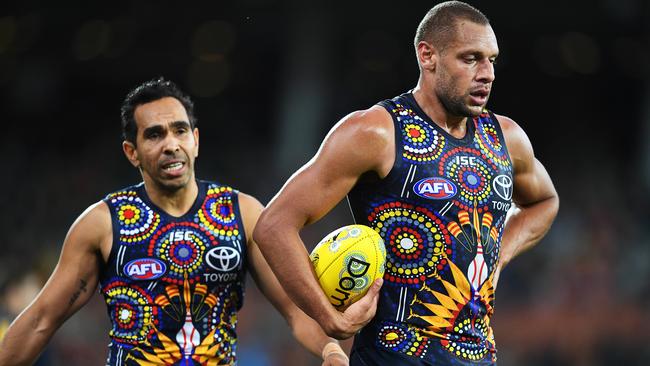 A visibly spent Cam Ellis-Yolman and Eddie Betts in the Crows’ loss to West Coast at Adelaide Oval on Saturday. Picture: Mark Brake/Getty Images