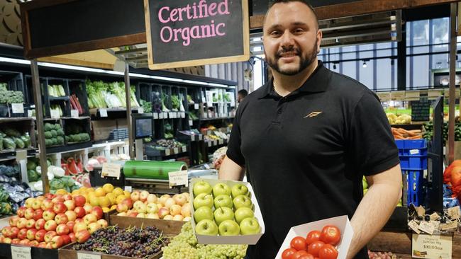 Jonathan Parini was working in the real estate industry but sought new work – and career opportunities – when his former employer couldn’t keep him at the height of lockdowns. He is now in charge of organic produce at Frewville Foodland. Picture: Kylie Fleming.