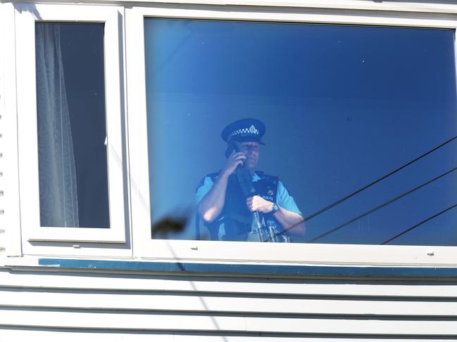 A police officer inside Brenton Tarrant’s Dunedin house. Picture: Gary Ramage