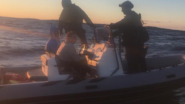 Queensland Police Service SERT officers intercept Dru Baggaley's boat.