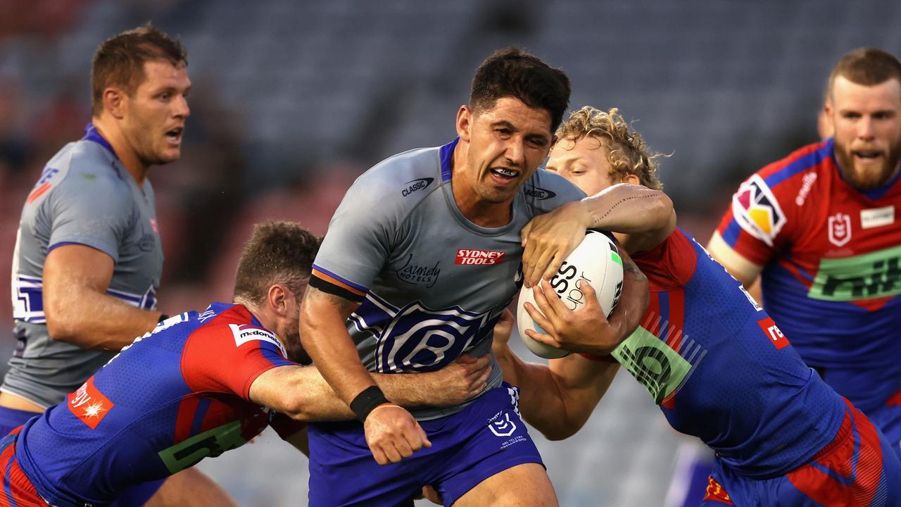 Bulldogs star Jeremy Marshall-King charges into the knights defence.