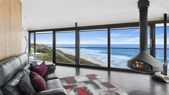 Inside the Pole House, complete with its stunning beach views.