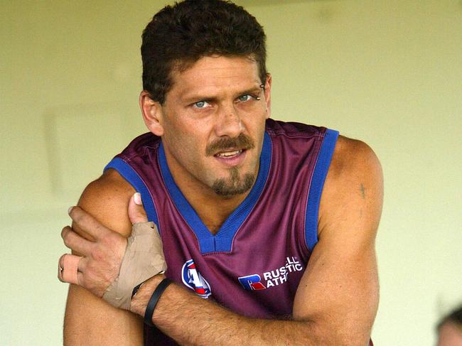 Darryl ‘Whitey’ White as a vital cog in the Brisbane Lions’ premiership threepeat from 2001-03. Picture: Nathan Richter