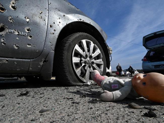 Russians ‘gun down kids’ as Kyiv prepares for siege