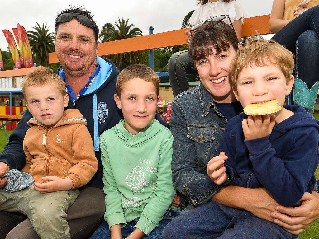 Lismore family Rick and Meagan Larsson with Kai, Harvey and Max watching the FMX bikes in the main arena at the Lismore Show. Picture: Cath Piltz