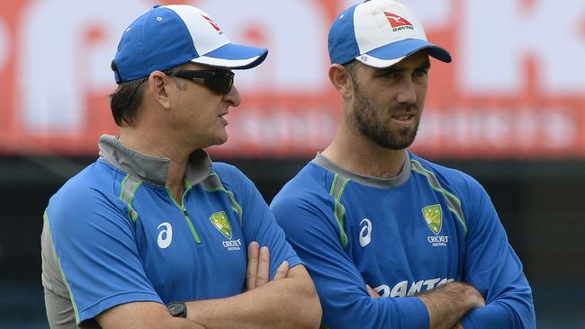 Glenn Maxwell (right) and team selector Mark Waugh. Picture: AFP