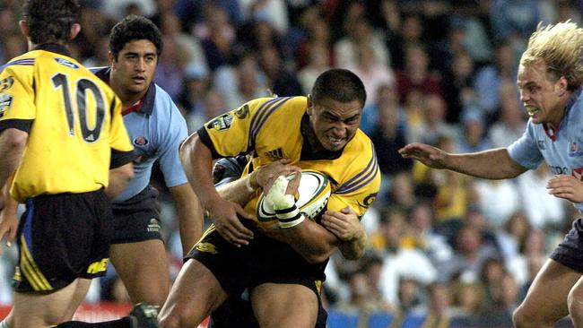 17/04/04 Super 12 at Aussie stadium NSW Waratahs vs NZ Hurricanes Waratahs win 42-30 Jerry Collins is tackled