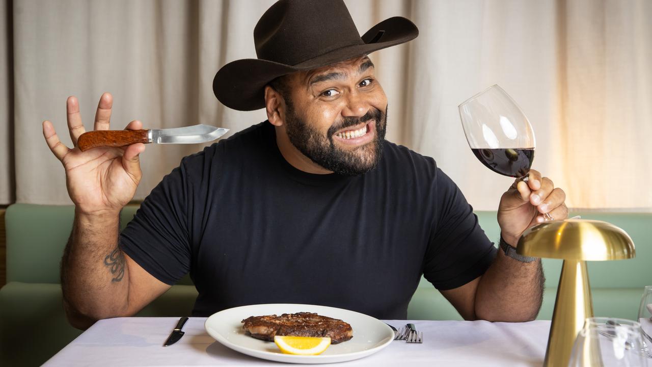 Sam Thaiday with his personalised steak knife at the new restaurant Black Hide Steak and Seafood in Queens Wharf. Picture: Nigel Hallett