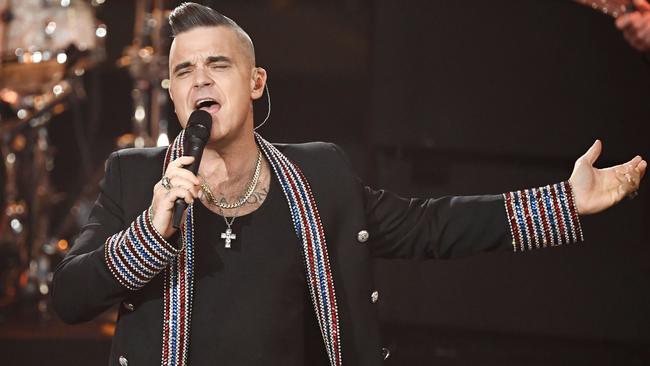 British singer Robbie Williams is headed Down Under. Picture: Jens Meyer/AFP