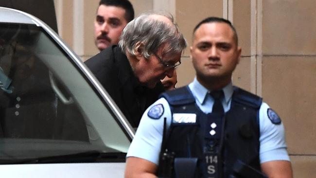 Cardinal George Pell arrives at the Supreme Court of Victoria in 2019