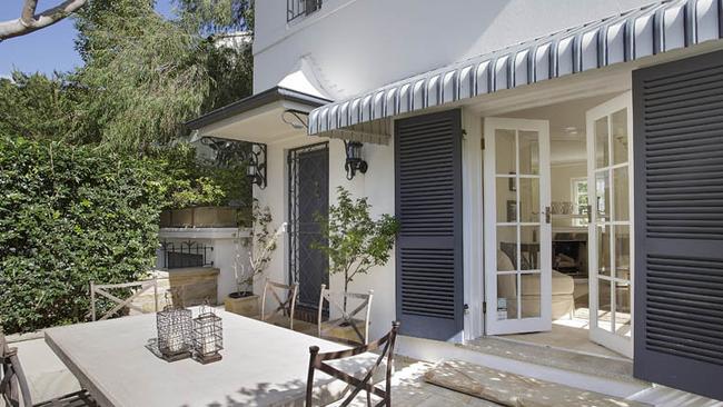 Over two stories, this 224sq m apartment, or maisonette, has two courtyards and a marble kitchen.