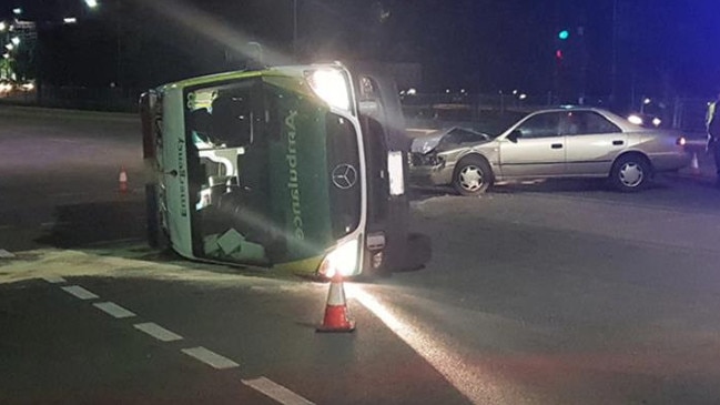 An ambulance flipped on its side in a crash outside the Royal Adelaide Hospital in September, 2018. Picture: Paul Purcell