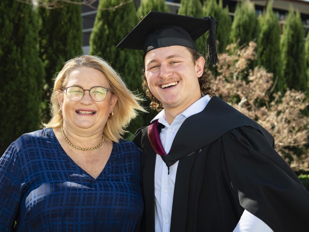 Bachelor of Spatial Science (Honours) graduate Luke Spreadborough is congratulated by his mum Karyn Stieler at the UniSQ graduation ceremony at Empire Theatres, Wednesday, June 28, 2023. Picture: Kevin Farmer