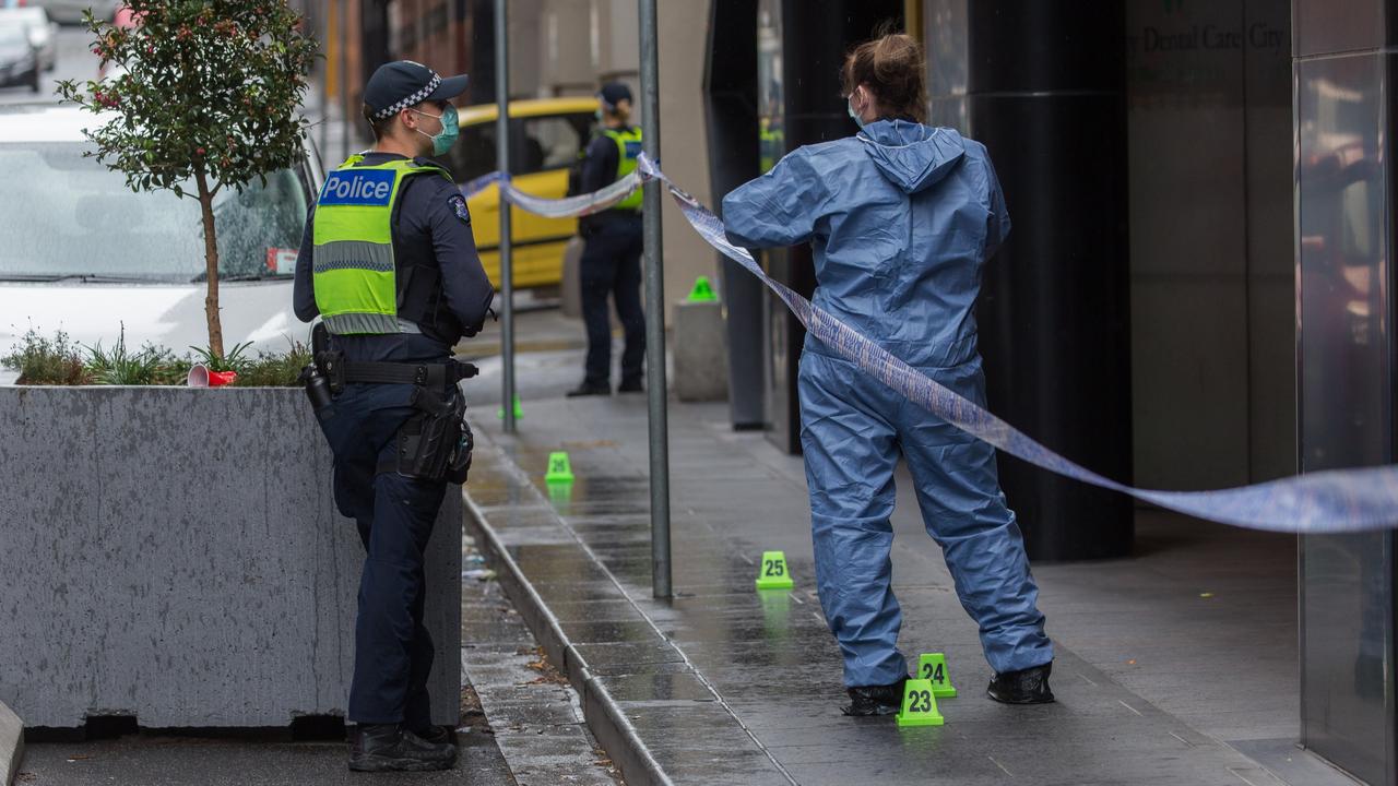 Police investigating outside a short-term rental property on Spencer Street after an alleged mass stabbing. Picture: NCA NewsWire / Paul Jeffers