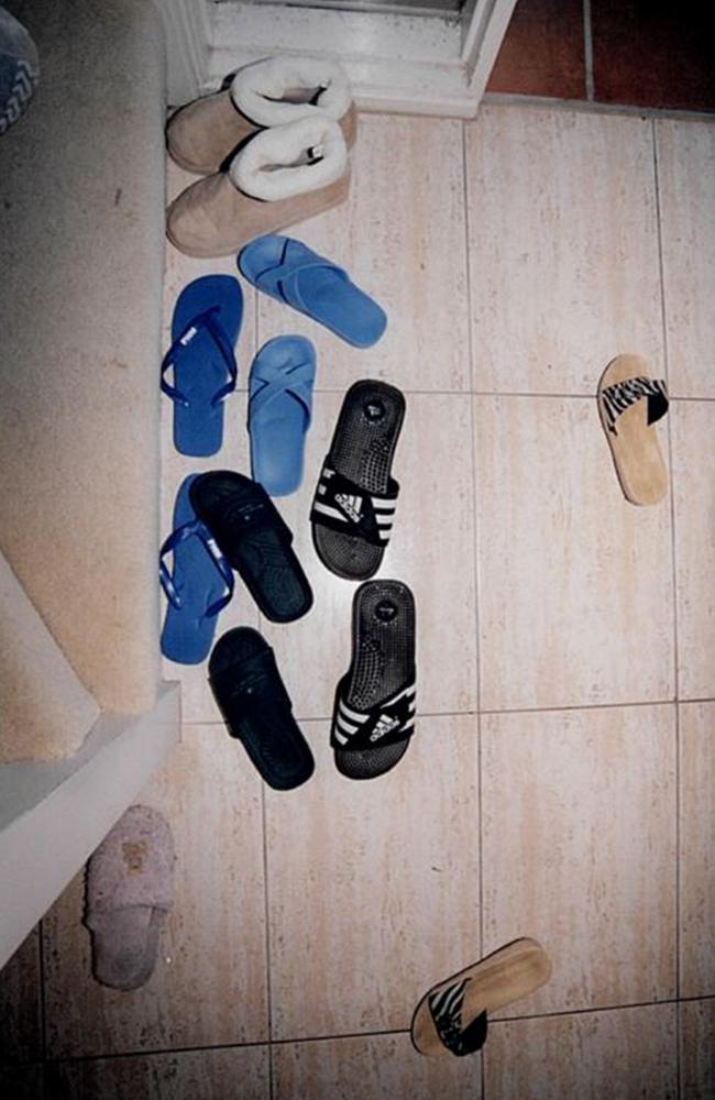 Shoes scattered at the door to the Lin house. - Picture: Supreme Court of NSW