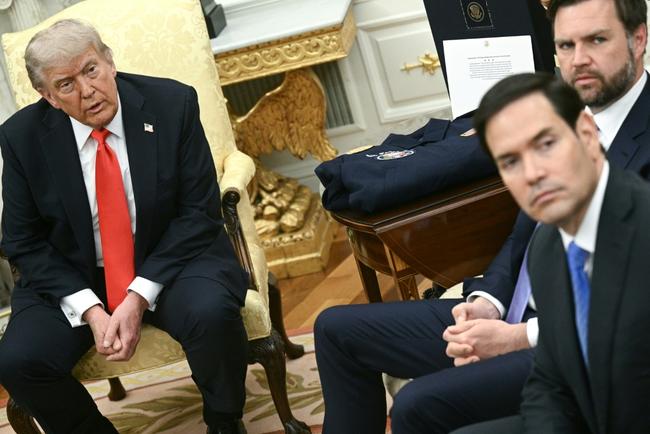 US President Donald Trump, Vice President JD Vance, and US Secretary of State Marco Rubio look on during a meeting with German Chancellor Friedrich Merz in the Oval Office